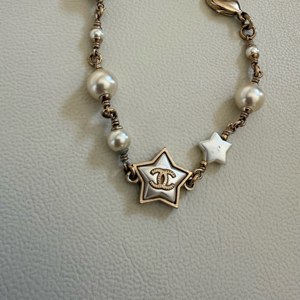CHANEL Elegant Star and Pearl Bracelet